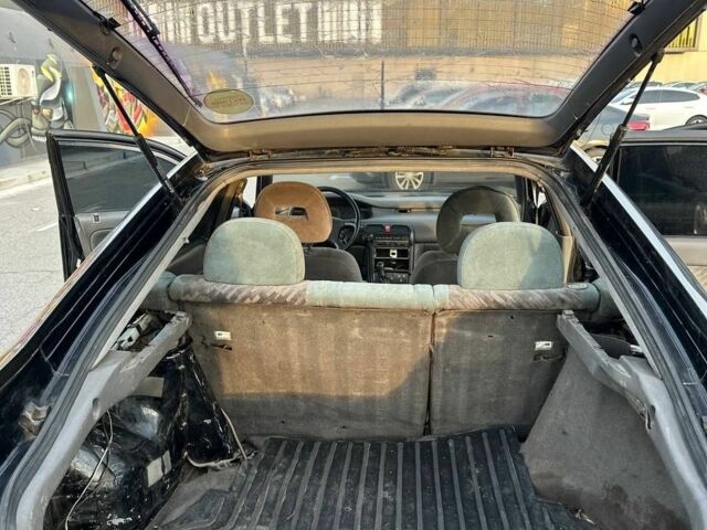 Черный Мазда 626, объемом двигателя 2.5 л и пробегом 483 тыс. км за 1200 $, фото 12 на Automoto.ua