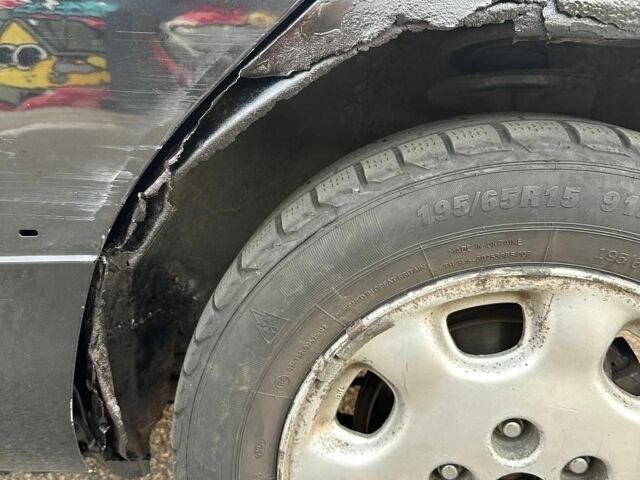 Черный Мазда 626, объемом двигателя 2.5 л и пробегом 483 тыс. км за 1200 $, фото 5 на Automoto.ua