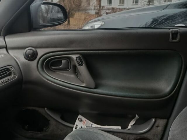 Черный Мазда 626, объемом двигателя 2.5 л и пробегом 480 тыс. км за 1400 $, фото 4 на Automoto.ua