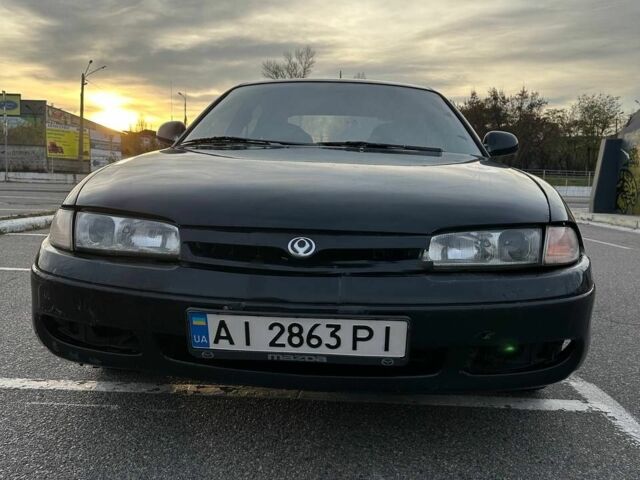 Черный Мазда 626, объемом двигателя 2.5 л и пробегом 483 тыс. км за 1200 $, фото 1 на Automoto.ua