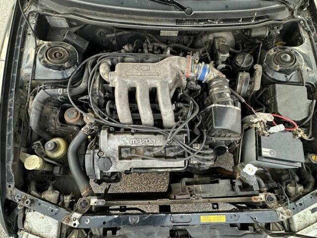 Черный Мазда 626, объемом двигателя 2.5 л и пробегом 483 тыс. км за 1200 $, фото 8 на Automoto.ua