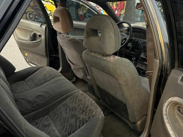 Черный Мазда 626, объемом двигателя 2.5 л и пробегом 483 тыс. км за 1200 $, фото 7 на Automoto.ua