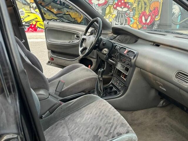 Черный Мазда 626, объемом двигателя 2.5 л и пробегом 483 тыс. км за 1200 $, фото 10 на Automoto.ua