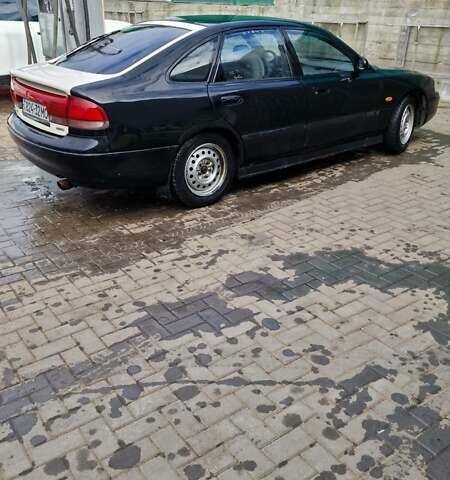 Черный Мазда 626, объемом двигателя 2.5 л и пробегом 380 тыс. км за 1500 $, фото 10 на Automoto.ua