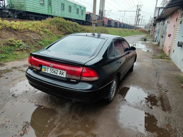 Черный Мазда 626, объемом двигателя 2 л и пробегом 573 тыс. км за 1100 $, фото 2 на Automoto.ua