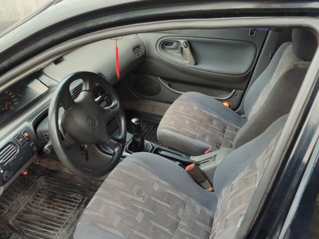 Черный Мазда 626, объемом двигателя 2 л и пробегом 573 тыс. км за 1100 $, фото 4 на Automoto.ua