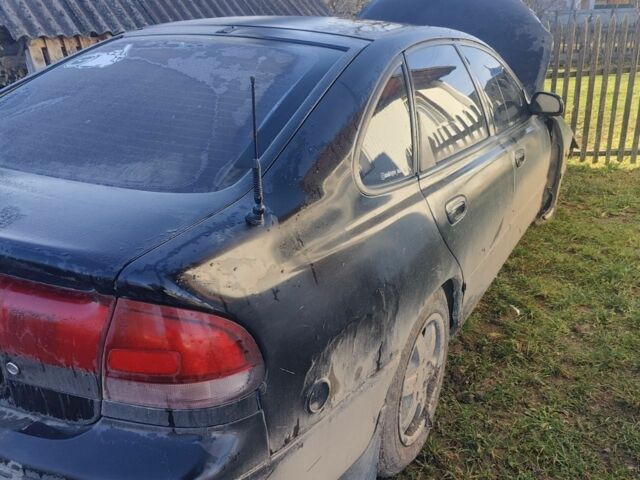 Черный Мазда 626, объемом двигателя 2 л и пробегом 480 тыс. км за 750 $, фото 4 на Automoto.ua