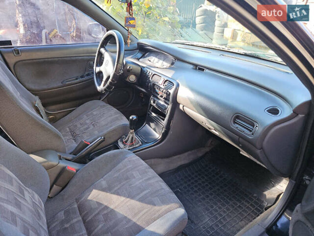 Чорний Мазда 626, об'ємом двигуна 1.99 л та пробігом 350 тис. км за 1500 $, фото 5 на Automoto.ua