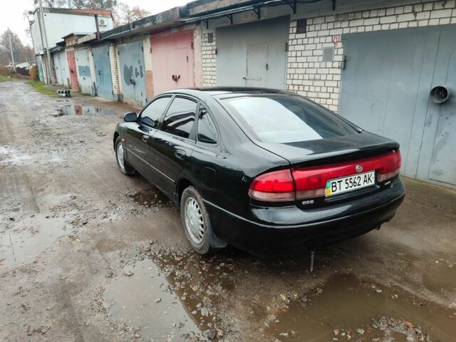 Черный Мазда 626, объемом двигателя 2 л и пробегом 573 тыс. км за 1100 $, фото 3 на Automoto.ua