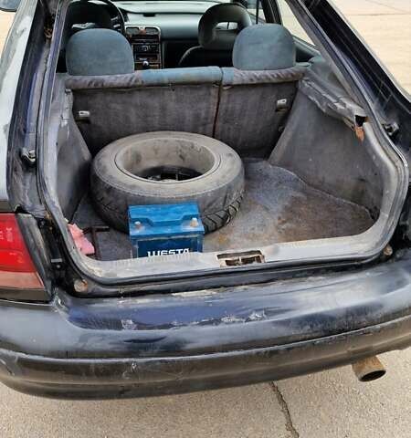 Черный Мазда 626, объемом двигателя 2.5 л и пробегом 380 тыс. км за 1500 $, фото 6 на Automoto.ua