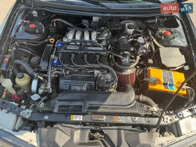 Чорний Мазда 626, об'ємом двигуна 1.8 л та пробігом 310 тис. км за 3300 $, фото 4 на Automoto.ua