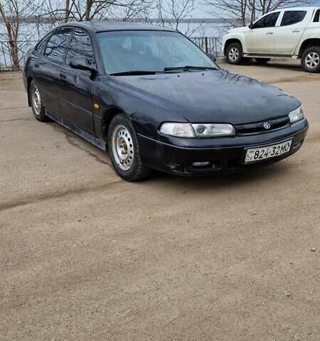 Черный Мазда 626, объемом двигателя 2.5 л и пробегом 380 тыс. км за 1500 $, фото 9 на Automoto.ua