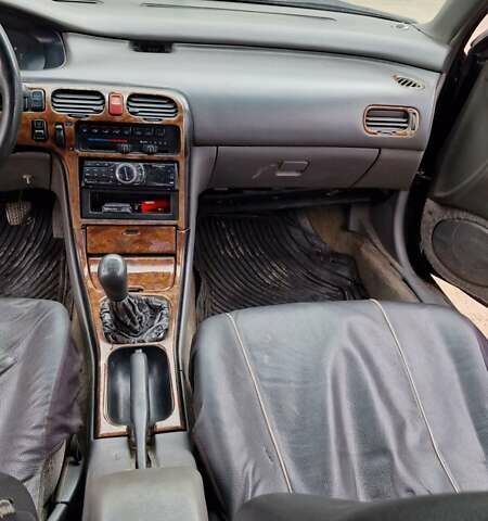 Черный Мазда 626, объемом двигателя 2.5 л и пробегом 380 тыс. км за 1500 $, фото 8 на Automoto.ua