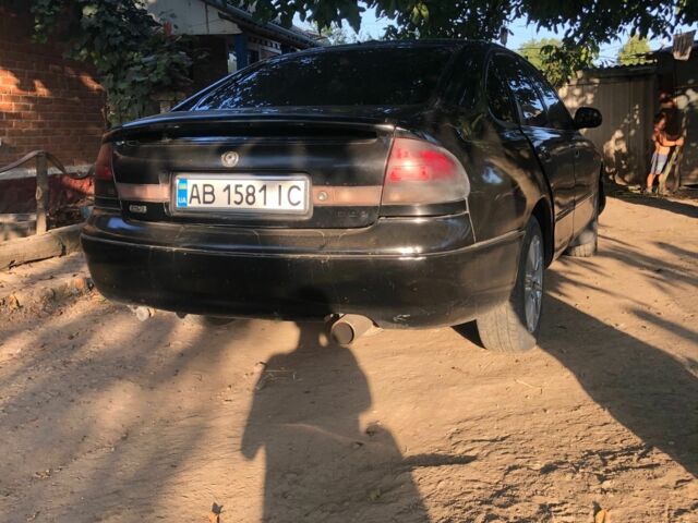 Черный Мазда 626, объемом двигателя 1.8 л и пробегом 400 тыс. км за 1800 $, фото 3 на Automoto.ua