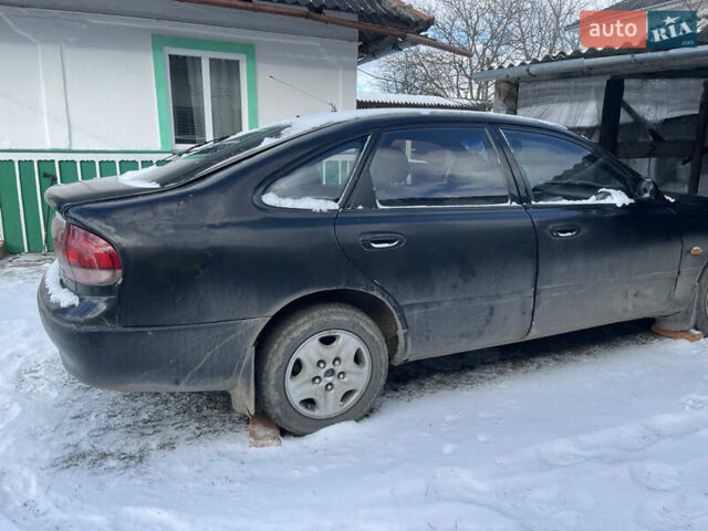 Чорний Мазда 626, об'ємом двигуна 1.99 л та пробігом 200 тис. км за 708 $, фото 3 на Automoto.ua