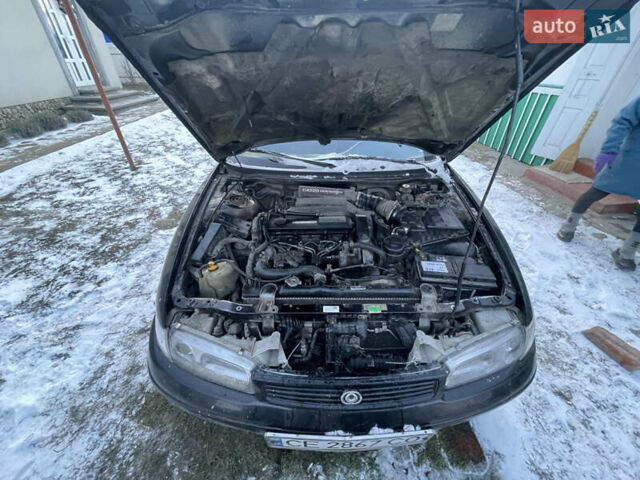 Чорний Мазда 626, об'ємом двигуна 1.99 л та пробігом 200 тис. км за 708 $, фото 5 на Automoto.ua