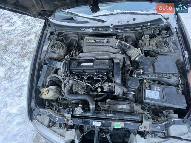 Чорний Мазда 626, об'ємом двигуна 1.99 л та пробігом 200 тис. км за 708 $, фото 9 на Automoto.ua