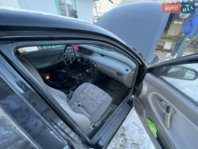 Чорний Мазда 626, об'ємом двигуна 1.99 л та пробігом 200 тис. км за 708 $, фото 1 на Automoto.ua