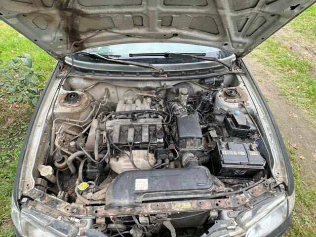 Черный Мазда 626, объемом двигателя 0 л и пробегом 330 тыс. км за 534 $, фото 1 на Automoto.ua