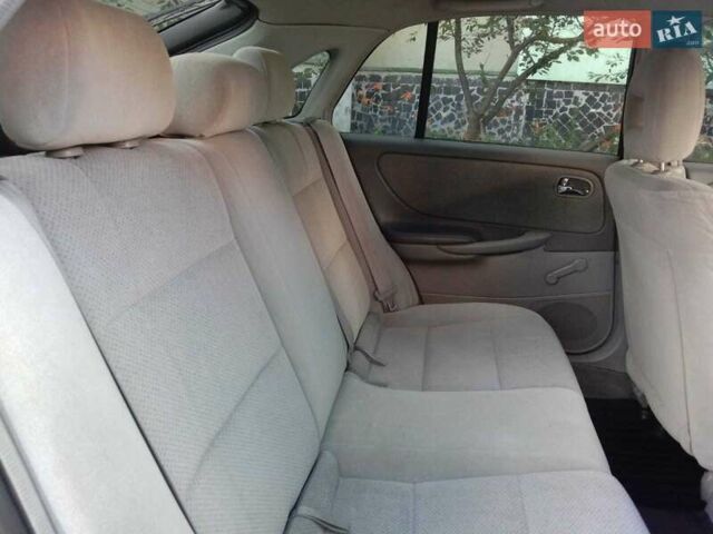 Черный Мазда 626, объемом двигателя 1.8 л и пробегом 316 тыс. км за 2700 $, фото 5 на Automoto.ua