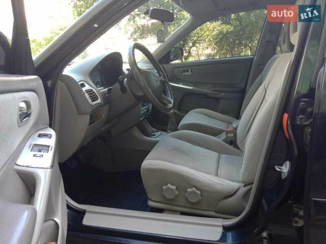 Черный Мазда 626, объемом двигателя 1.8 л и пробегом 316 тыс. км за 2700 $, фото 4 на Automoto.ua