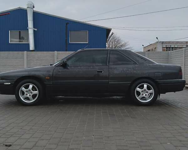 Черный Мазда 626, объемом двигателя 2.2 л и пробегом 650 тыс. км за 2000 $, фото 5 на Automoto.ua