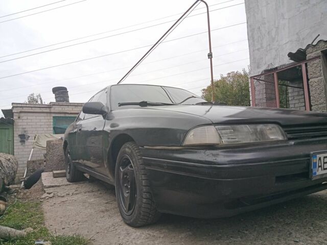 Мазда 626 1990 в Каменское - Днепродзержинск на Automoto.ua Черный Мазда 626, объемом двигателя 2.2 л и пробегом 400 тыс. км за 1350 $, фото 6 на Automoto.ua