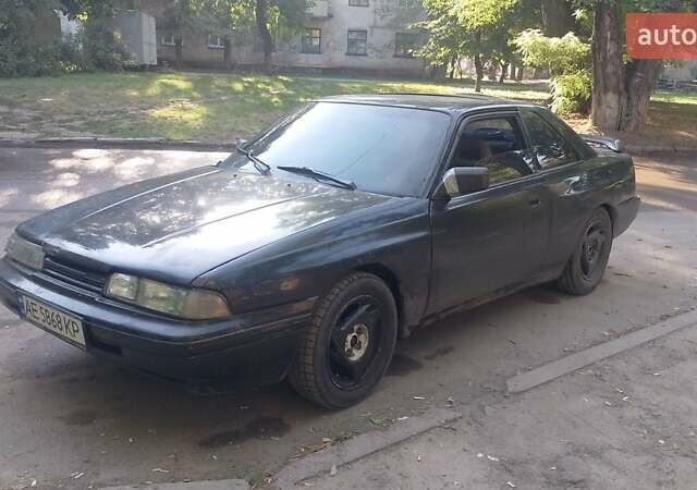 Черный Мазда 626, объемом двигателя 2.2 л и пробегом 400 тыс. км за 1200 $, фото 2 на Automoto.ua