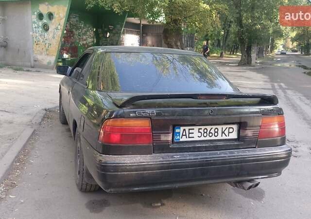 Черный Мазда 626, объемом двигателя 2.2 л и пробегом 400 тыс. км за 1200 $, фото 3 на Automoto.ua