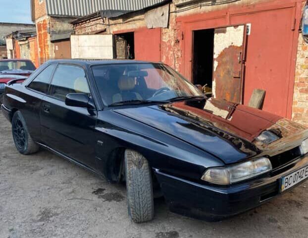 Черный Мазда 626, объемом двигателя 2.2 л и пробегом 280 тыс. км за 1900 $, фото 4 на Automoto.ua