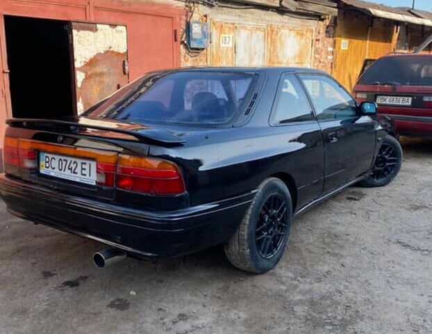 Черный Мазда 626, объемом двигателя 2.2 л и пробегом 280 тыс. км за 1900 $, фото 5 на Automoto.ua