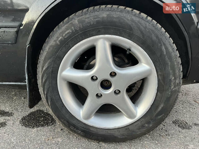 Черный Мазда 626, объемом двигателя 2 л и пробегом 420 тыс. км за 1300 $, фото 9 на Automoto.ua