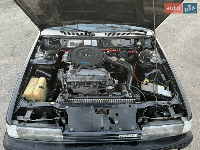 Черный Мазда 626, объемом двигателя 2 л и пробегом 420 тыс. км за 1300 $, фото 8 на Automoto.ua