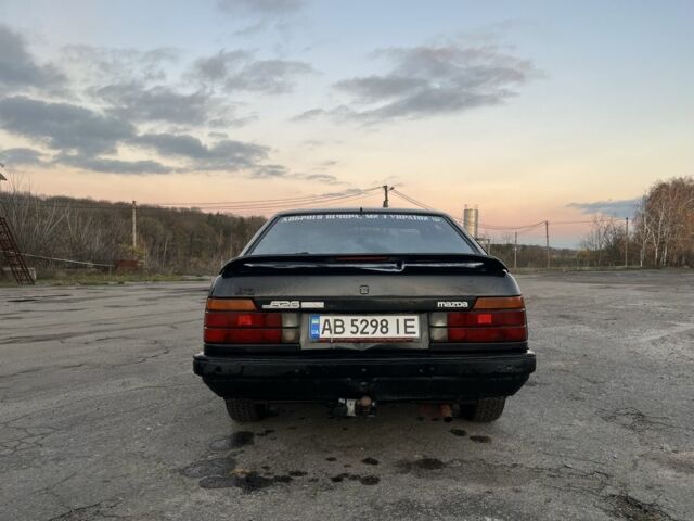 Черный Мазда 626, объемом двигателя 2 л и пробегом 420 тыс. км за 1300 $, фото 2 на Automoto.ua