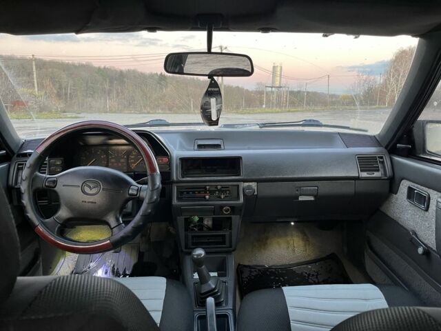 Черный Мазда 626, объемом двигателя 2 л и пробегом 420 тыс. км за 1300 $, фото 6 на Automoto.ua