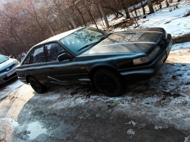 Черный Мазда 626, объемом двигателя 0 л и пробегом 200 тыс. км за 700 $, фото 2 на Automoto.ua