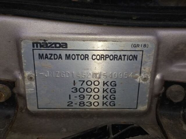 Черный Мазда 626, объемом двигателя 0 л и пробегом 200 тыс. км за 700 $, фото 1 на Automoto.ua