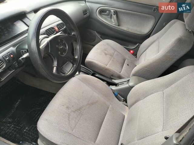 Черный Мазда 626, объемом двигателя 2 л и пробегом 410 тыс. км за 1650 $, фото 11 на Automoto.ua