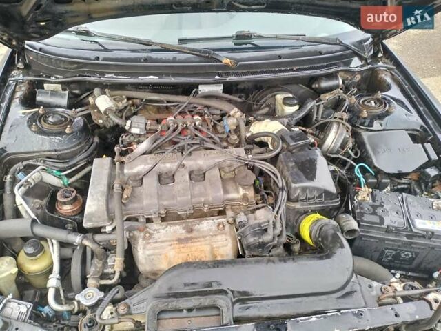 Черный Мазда 626, объемом двигателя 2 л и пробегом 410 тыс. км за 1650 $, фото 18 на Automoto.ua