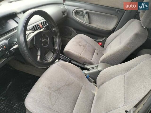 Черный Мазда 626, объемом двигателя 2 л и пробегом 410 тыс. км за 1650 $, фото 8 на Automoto.ua