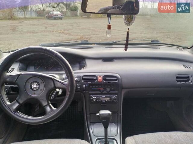 Черный Мазда 626, объемом двигателя 2 л и пробегом 410 тыс. км за 1650 $, фото 7 на Automoto.ua