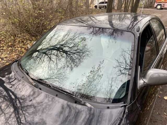 Черный Мазда 626, объемом двигателя 2 л и пробегом 300 тыс. км за 1150 $, фото 1 на Automoto.ua