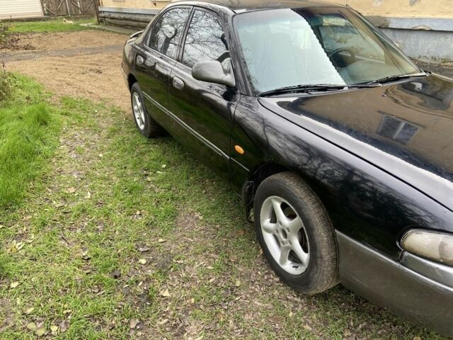 Черный Мазда 626, объемом двигателя 2 л и пробегом 300 тыс. км за 1150 $, фото 23 на Automoto.ua