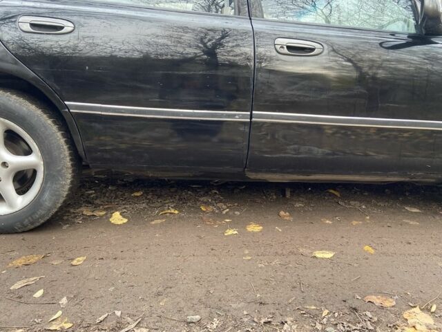 Черный Мазда 626, объемом двигателя 2 л и пробегом 300 тыс. км за 1150 $, фото 9 на Automoto.ua