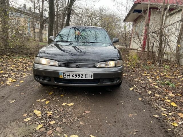 Черный Мазда 626, объемом двигателя 2 л и пробегом 300 тыс. км за 1150 $, фото 2 на Automoto.ua