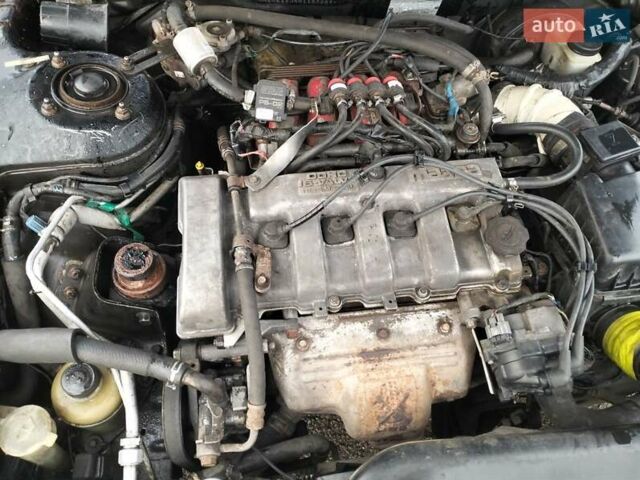 Черный Мазда 626, объемом двигателя 2 л и пробегом 410 тыс. км за 1650 $, фото 20 на Automoto.ua