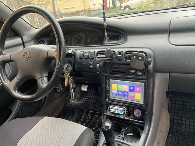 Черный Мазда 626, объемом двигателя 2 л и пробегом 300 тыс. км за 1150 $, фото 21 на Automoto.ua