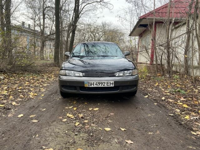 Черный Мазда 626, объемом двигателя 2 л и пробегом 300 тыс. км за 1150 $, фото 6 на Automoto.ua