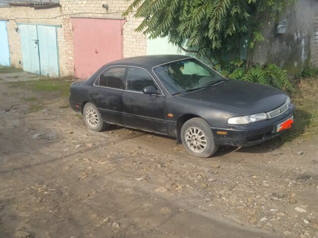 Черный Мазда 626, объемом двигателя 0 л и пробегом 300 тыс. км за 1069 $, фото 6 на Automoto.ua