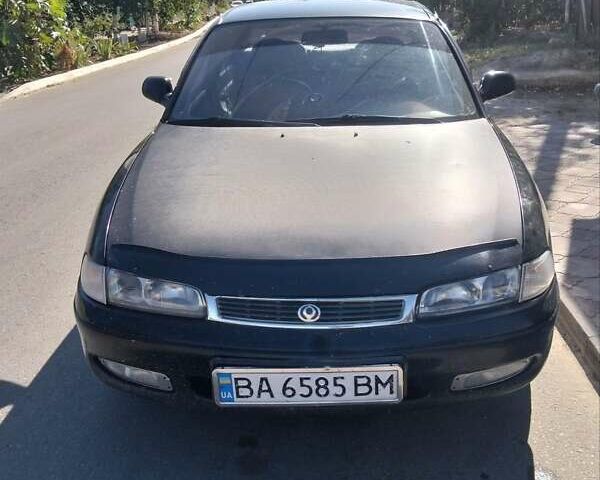 Чорний Мазда 626, об'ємом двигуна 2 л та пробігом 200 тис. км за 1700 $, фото 2 на Automoto.ua